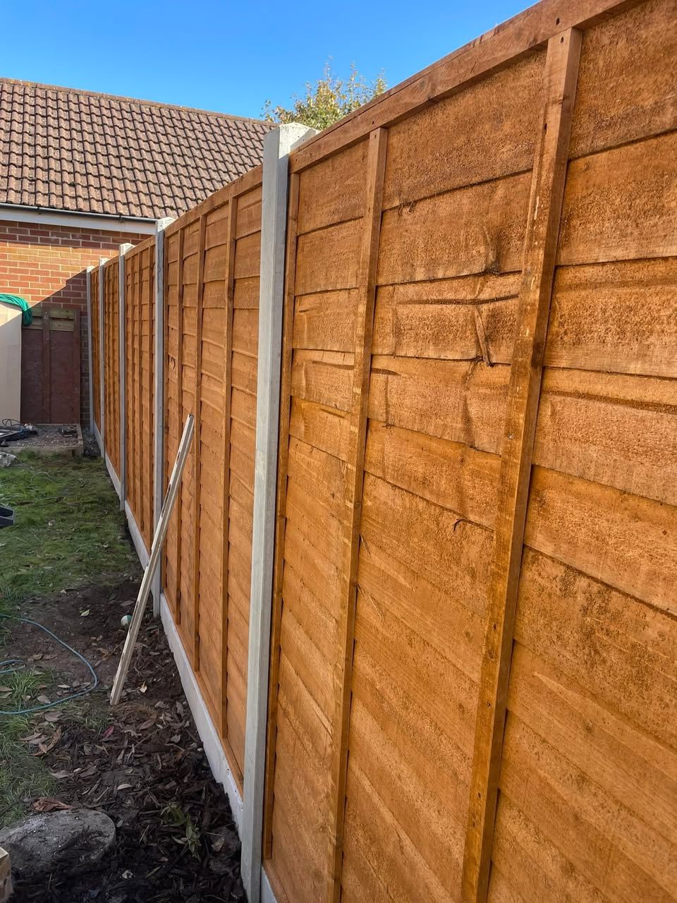 New 6ft 6in fence with concrete posts