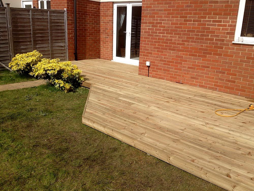 New decking wrapping round a house at Portishead Marina